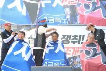 삭발로 벼른 투쟁 의지…현대모비스 밀실 …